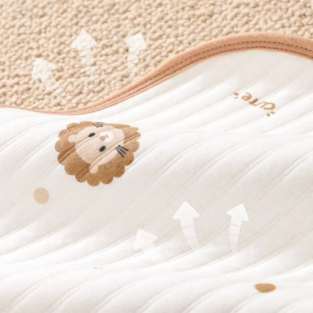 Tapis à langer nomade — doux, compact, à emporter partout