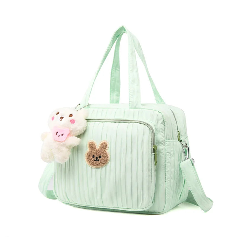 Sac à langer bébé motif lapin format compact