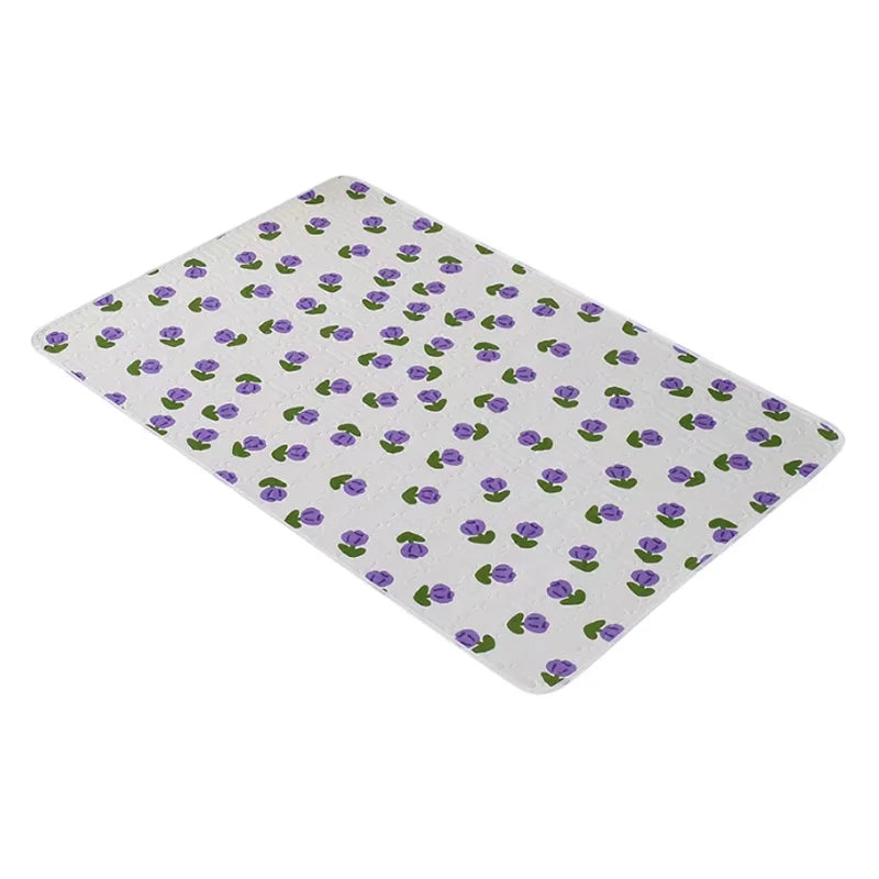Tapis à langer nomade 50 × 70 cm — léger, pliable, surface facile à essuyer