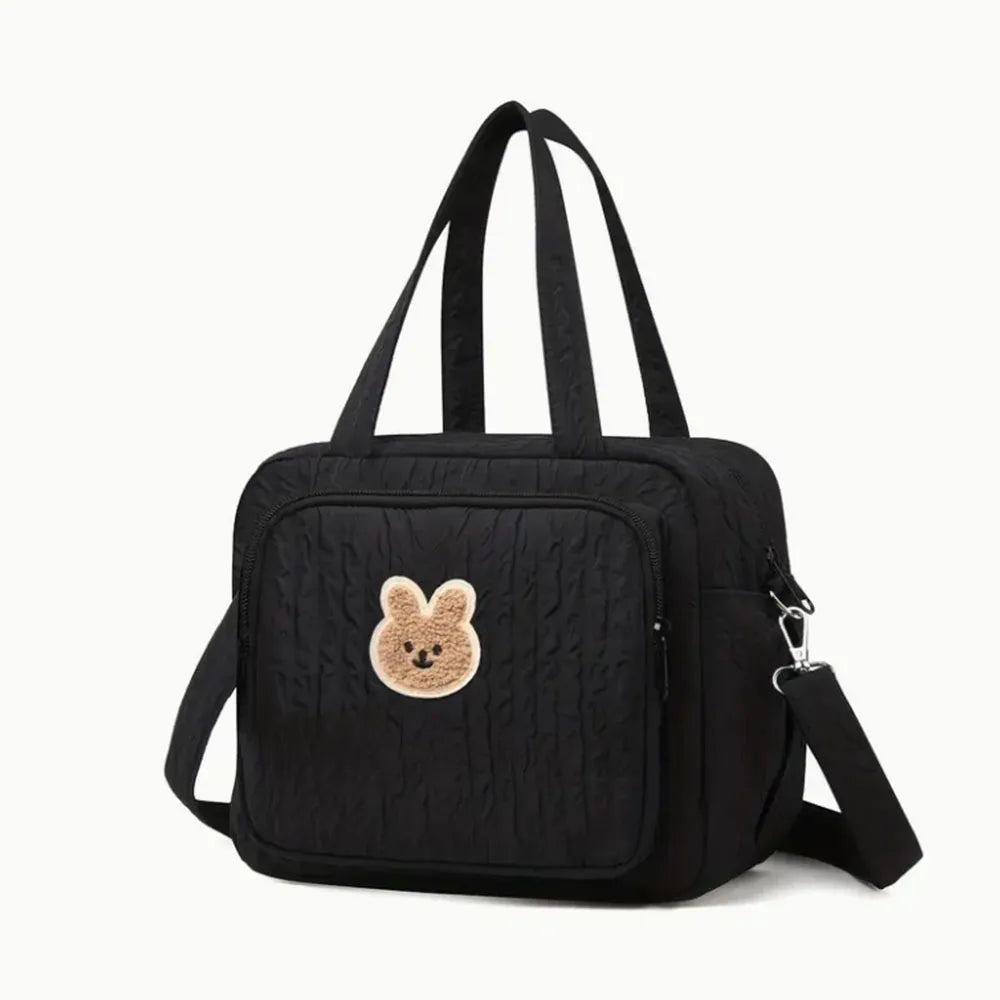 Sac à langer compact motif lapin matelassé