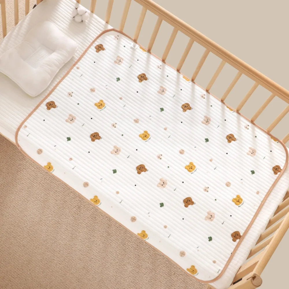 🎁 Tapis à langer nomade — doux, compact, à emporter partout