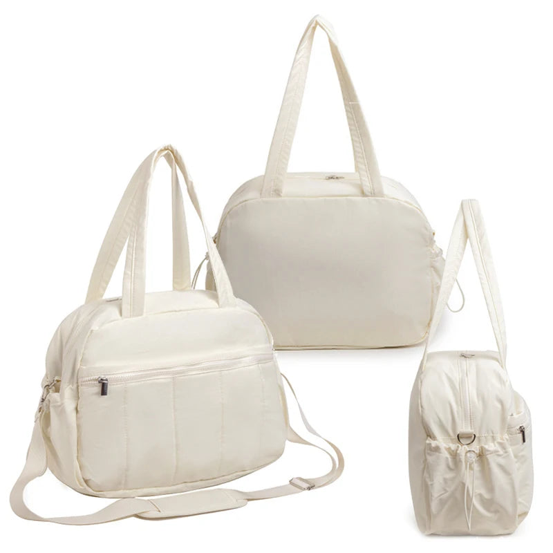 Sac à langer fourre-tout beige déperlant avec port épaule vue de 3 coter 