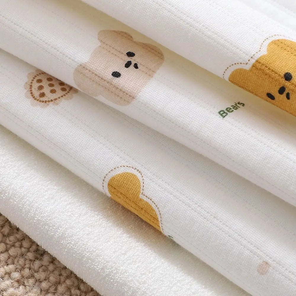 Tapis à langer nomade — doux, compact, à emporter partout