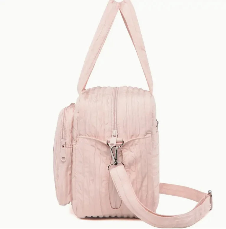 Sac à langer motif lapin matelassé et compact
