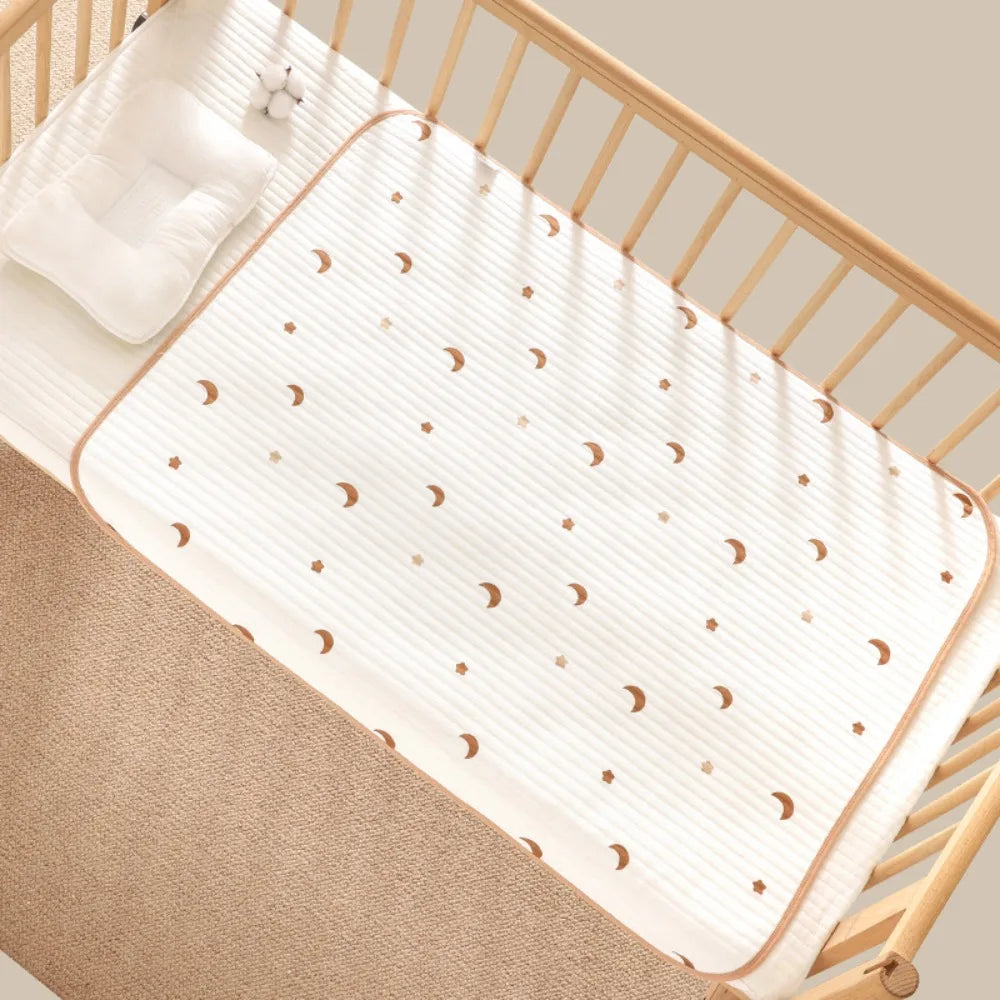 🎁 Tapis à langer nomade — doux, compact, à emporter partout