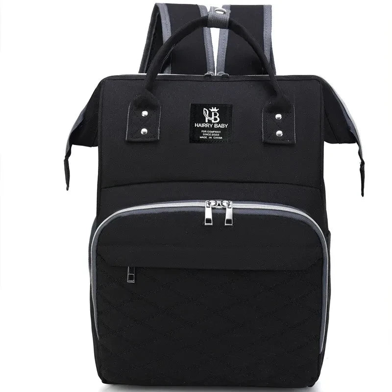 Sac à dos à langer noir pour papa, design sobre et grande capacité