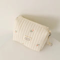 Pochette de rangement matelassée pour couches