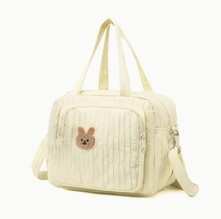 Sac à langer motif lapin doux et compact